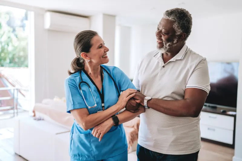 All Care live-in caregiver supporting a senior throughout the day in the Bronx